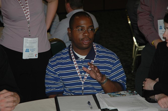 Rodgers leads a Table Topic at the 2005 CoSIDA Philadelphia Convention.